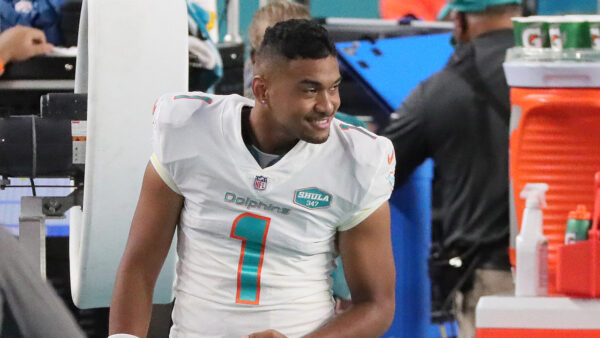 Tua smiling on the sideline after finally seeing the field in the NFL